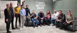 The initiators of the ideas competition, Karin Steiner (centre) together with the jury and the three final winners Jurij Tkaciov (3rd from right), Christian Stöger (6th from right) and Emanuel Stocker (2nd from right).